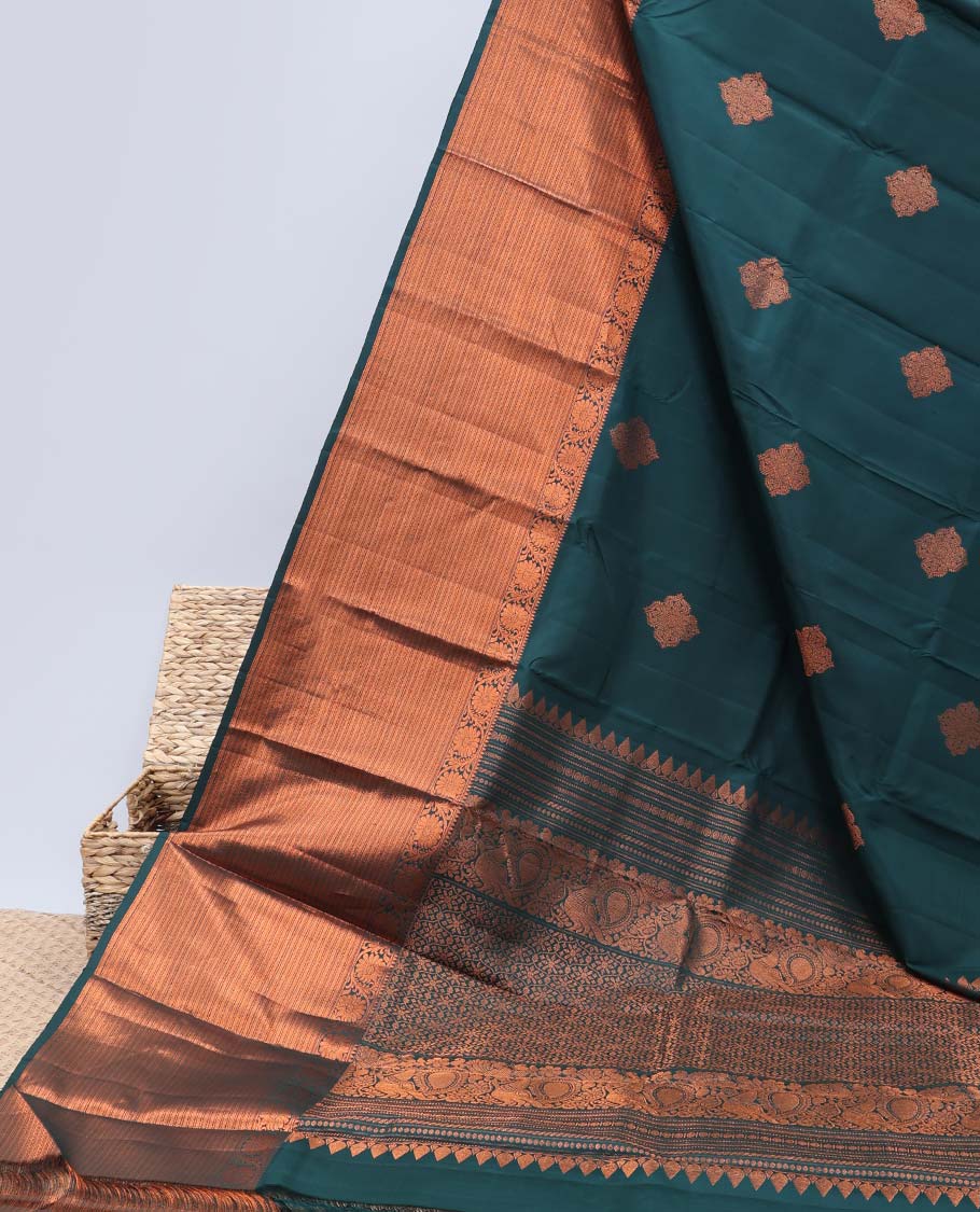 Green buttas kancheepuram koorai silksaree, traditional zari border of thilakam & kodi visiry & pallu of ogee & peacock