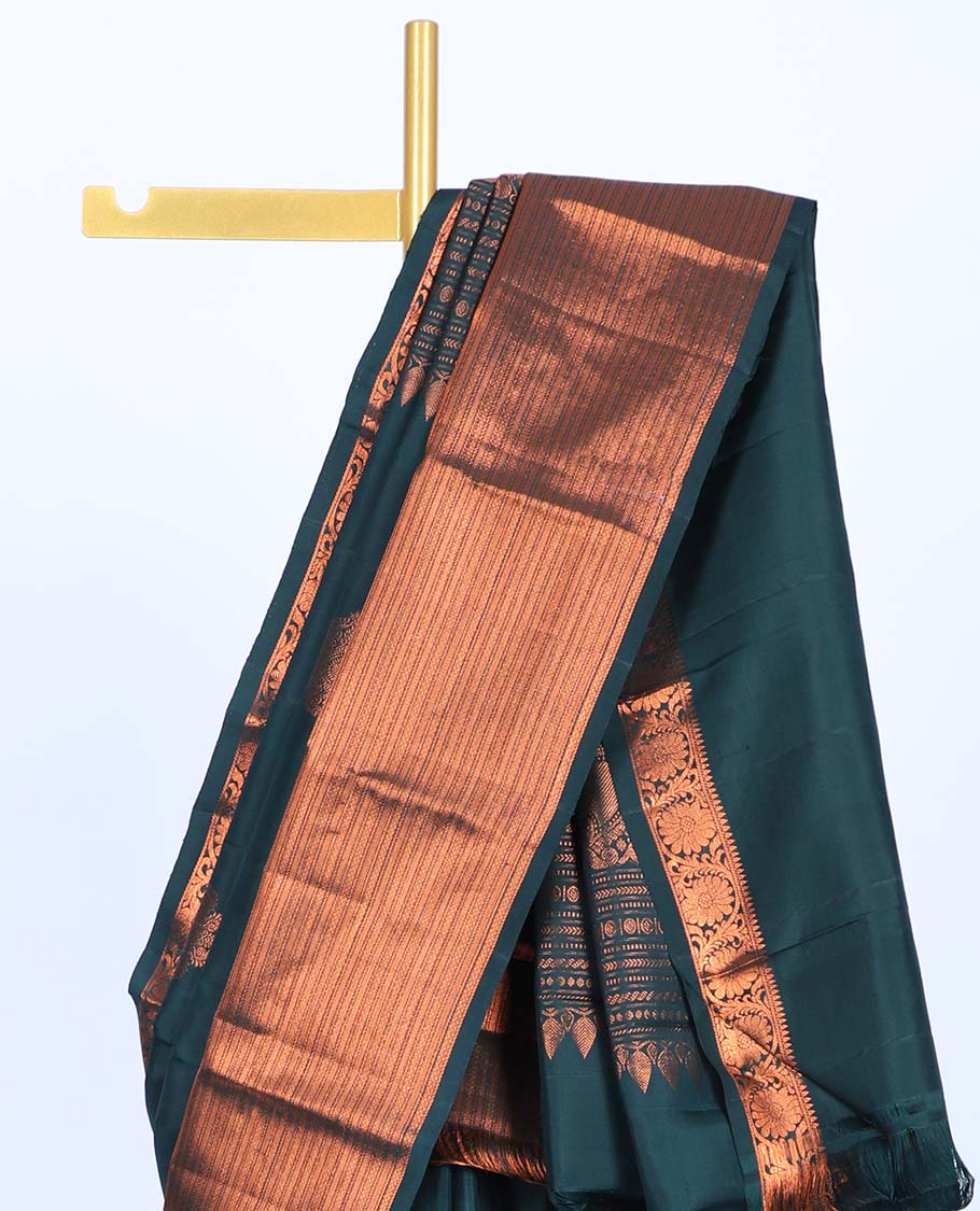 Green buttas kancheepuram koorai silksaree, traditional zari border of thilakam & kodi visiry & pallu of ogee & peacock