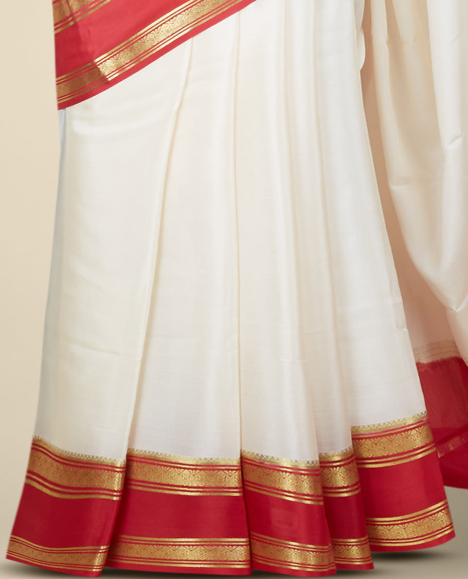 Cream plain design mysore silk saree, contrast traditional zari design border & pallu features zari stripes