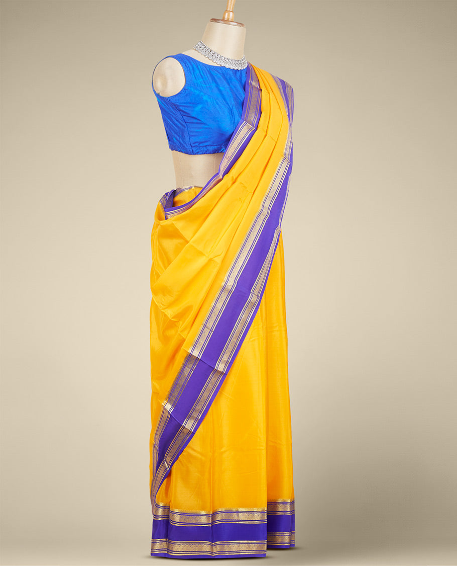 Yellow plain design mysore silk saree, contrast traditional zari design border & pallu of zari stripes