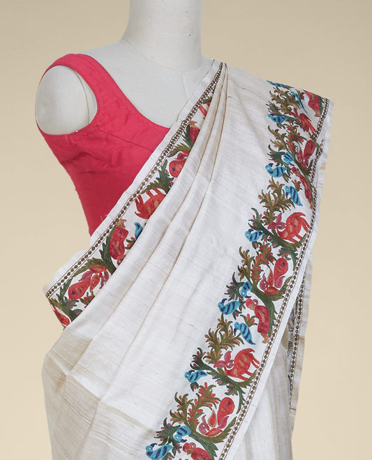 Sandal tusser saree, embroidered border of tree, figurines, deer, birds & peacock designs