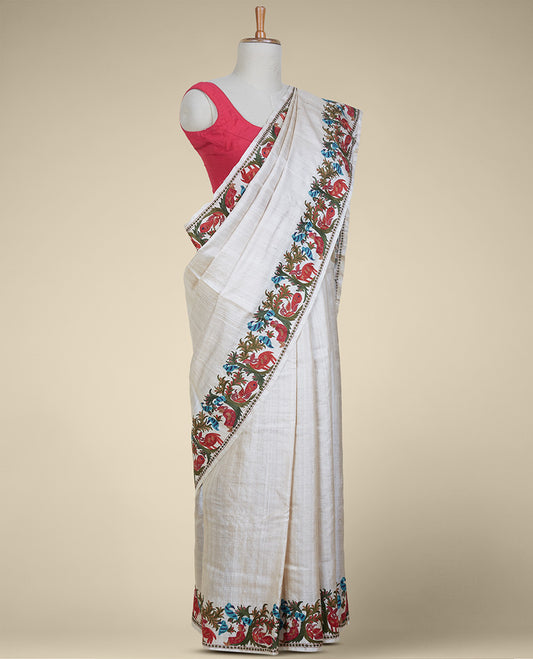 Sandal tusser saree, embroidered border of tree, figurines, deer, birds & peacock designs