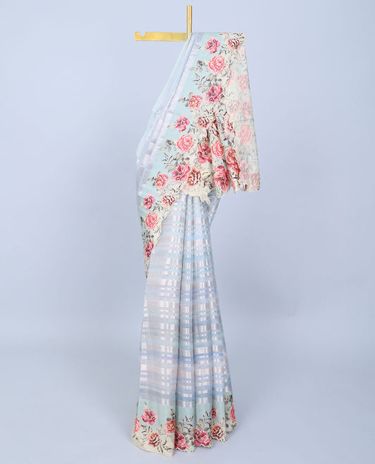 Blue zari designs Semi banaras jute saree, scallop border of traditional zari designs & floral printed pallu