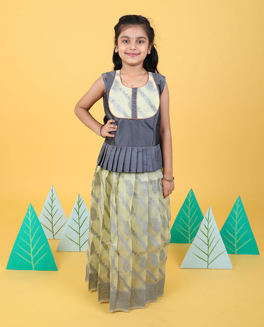 Pale yellow diagonal floral striped readymade art silk pavadai with zari border & sleeveless blouse