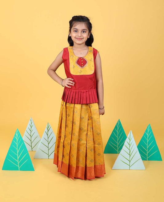 Yellow jacquard readymade art silk pavadai with contrast traditional zari border & sleeveless blouse