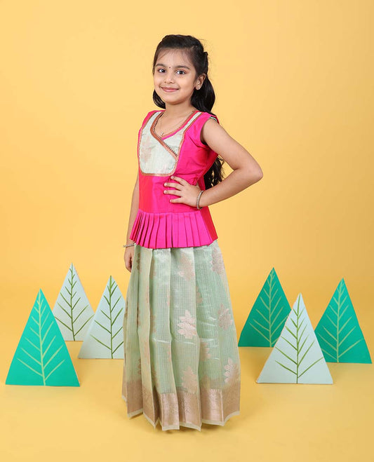 Green floral butta readymade art silk pavadai with traditional zari border & contrast sleeveless blouse