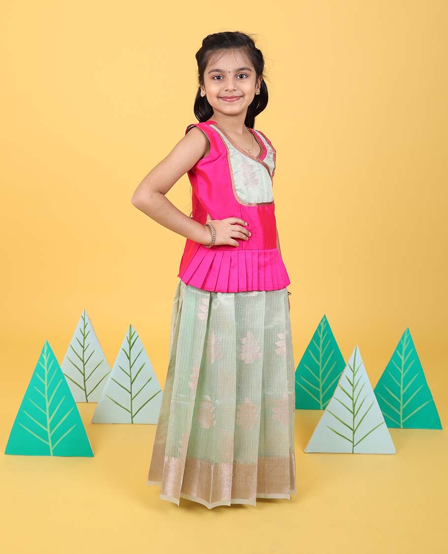 Green floral butta readymade art silk pavadai with traditional zari border & contrast sleeveless blouse