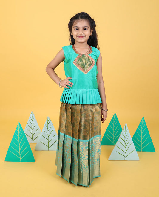 Beige readymade art silk pavadai with contrast traditional zari border of floral vine & sleeveless blouse
