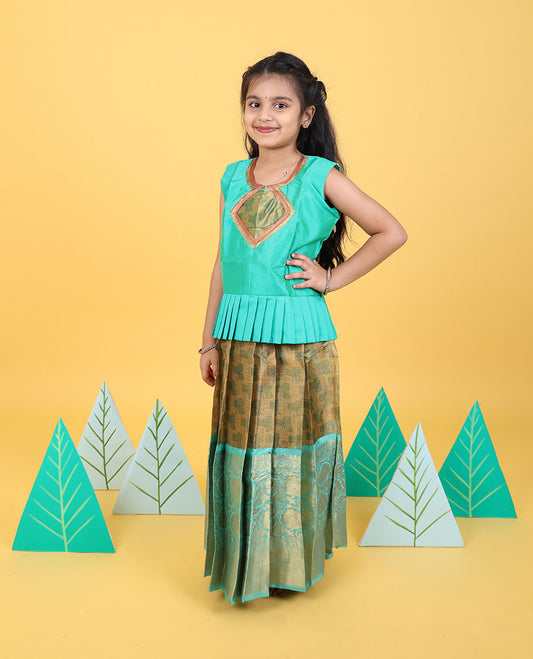 Beige readymade art silk pavadai with contrast traditional zari border of floral vine & sleeveless blouse
