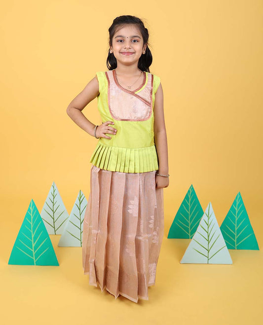 Light sandal floral butta readymade art silk pavadai with traditional zari border & contrast sleeveless blouse