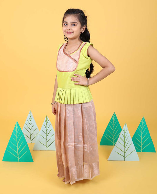 Light sandal floral butta readymade art silk pavadai with traditional zari border & contrast sleeveless blouse