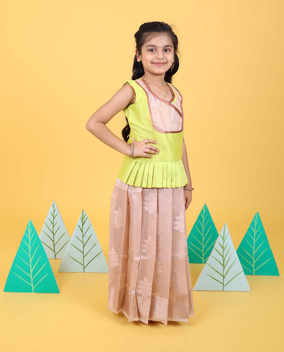 Light sandal floral butta readymade art silk pavadai with traditional zari border & contrast sleeveless blouse