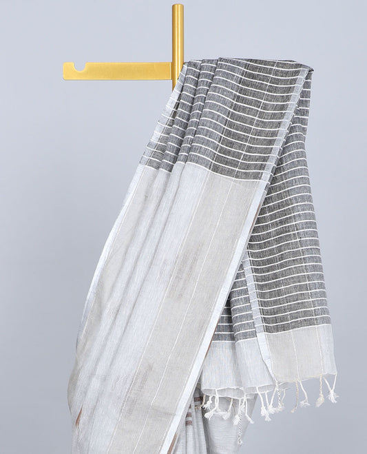 Light grey linen saree with buttas, striped border & self-pallu of stripes
