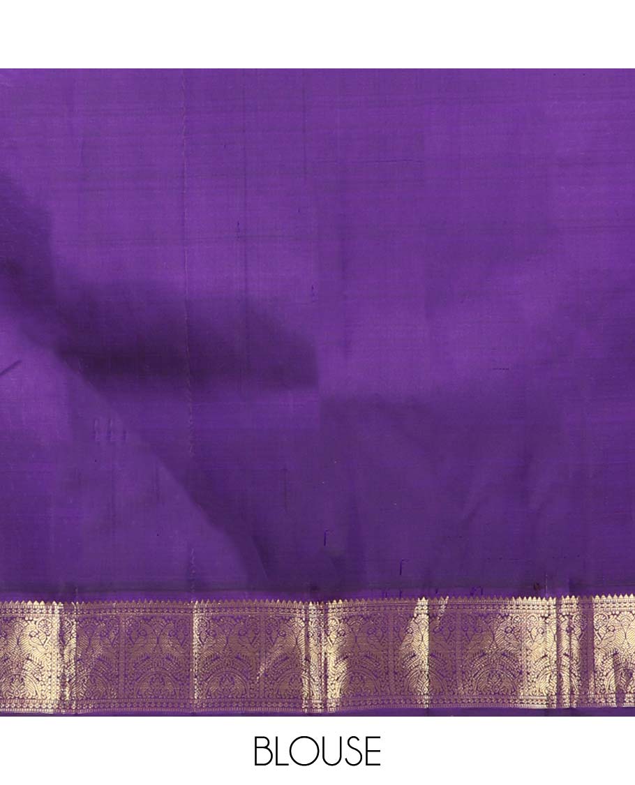 Orange kancheepuram silk saree with mayil & chakram buttas,contrast korvai border of rekku,muthu,lavangam,mayil & yaanai