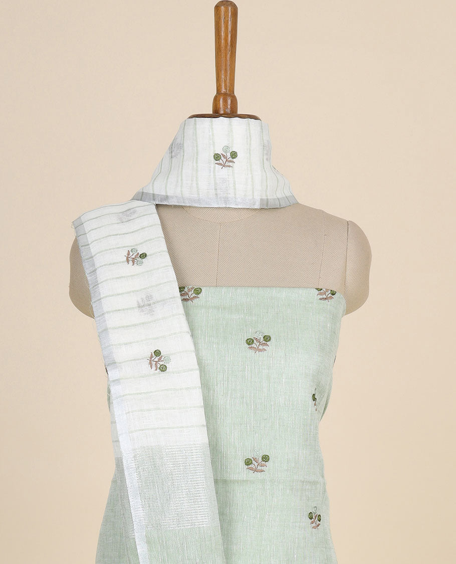 Green material chudidhar set, floral motifs thread embroidered top,plain bottom & floral embroidered dupatta