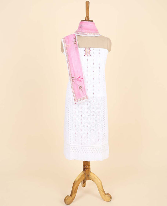 White material chudidhar set, cut-work embroidered top, contrast geometric printed bottom & floral printed dupatta