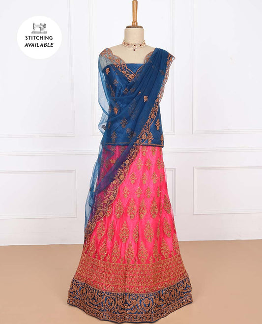 Fuchsia net lehenga with intricately embroidery skirt, contrast top & floral embroidered scallop dupatta