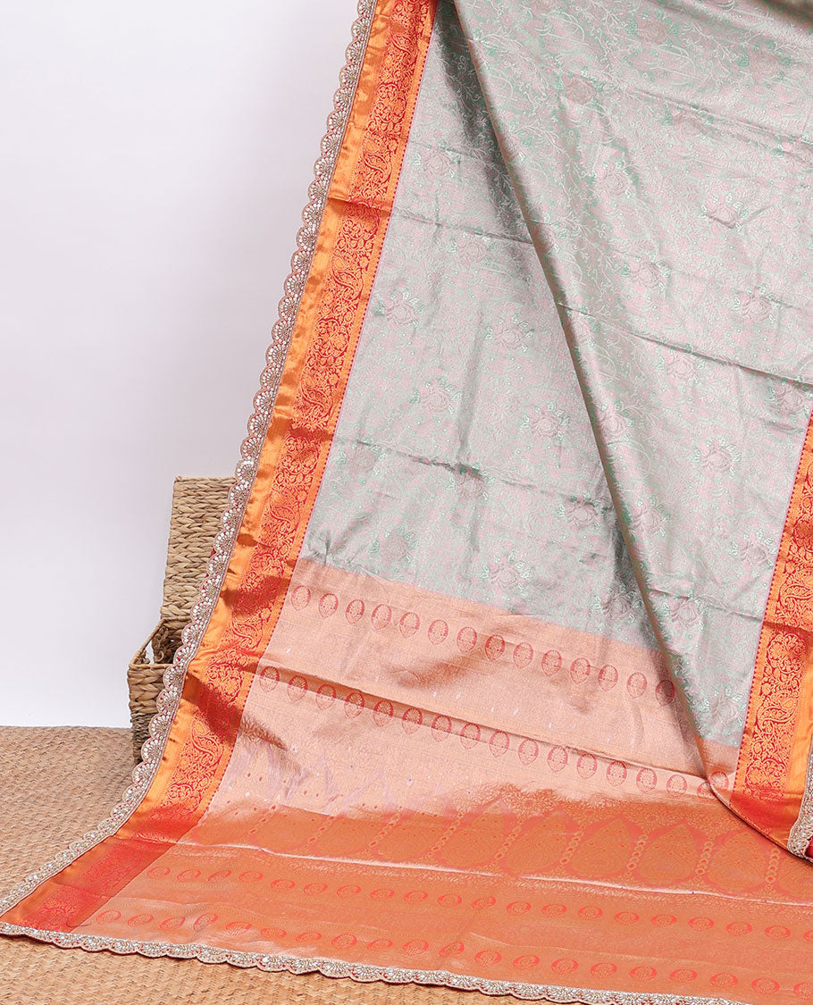 Green floral design banaras tissue saree, contrast traditional motifs with patch embroidery border & intricate pallu