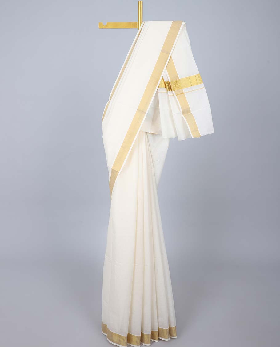 Cream plain design kerala saree, zari border & pallu of zari designs