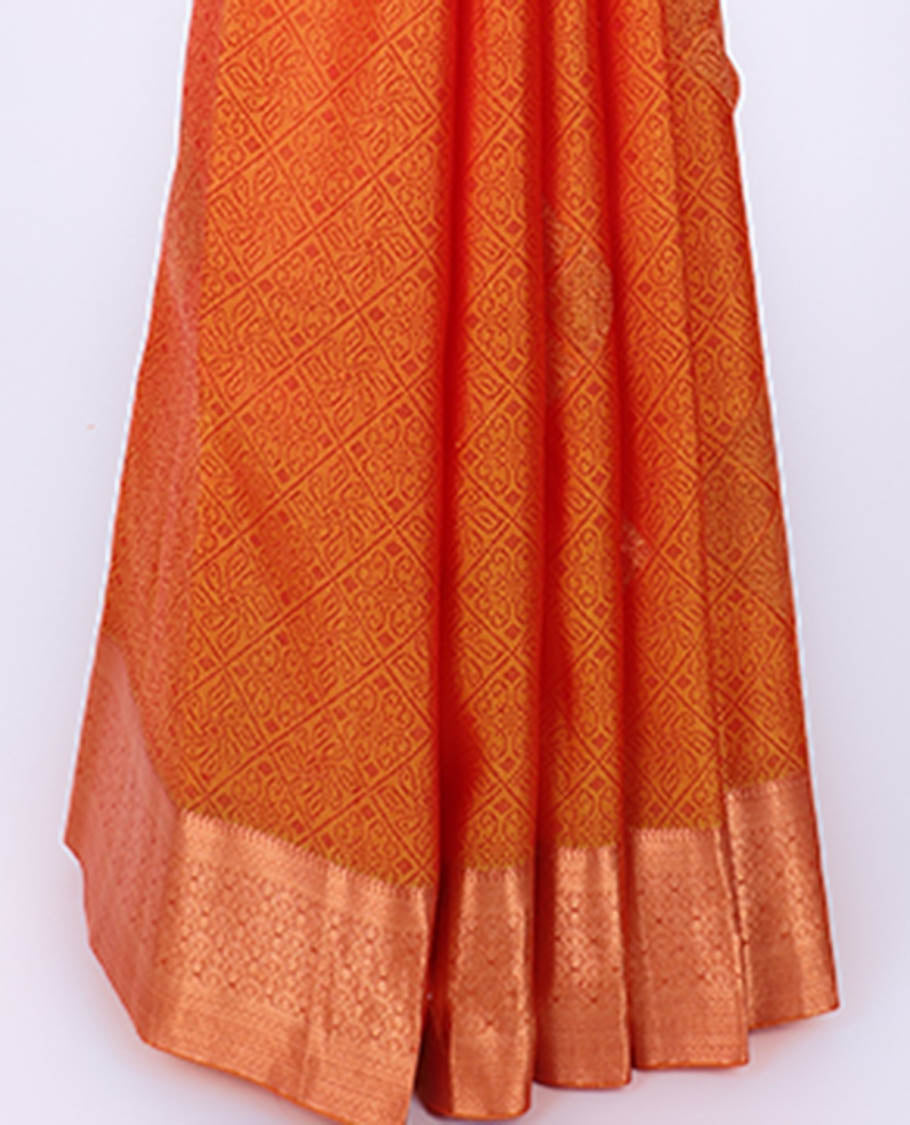 Orange embossed bangalore silk saree with buttas, traditional zari border & pallu of intricate designs