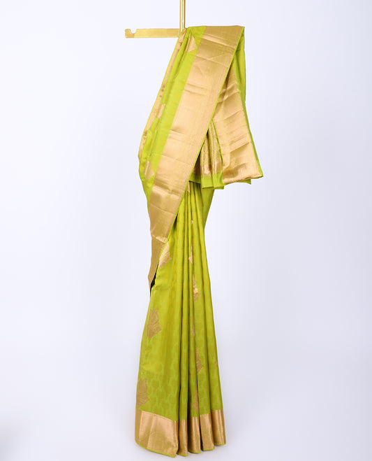Green embossed Bangalore silk saree with zari buttas, traditional zari border & pallu of intricate designs
