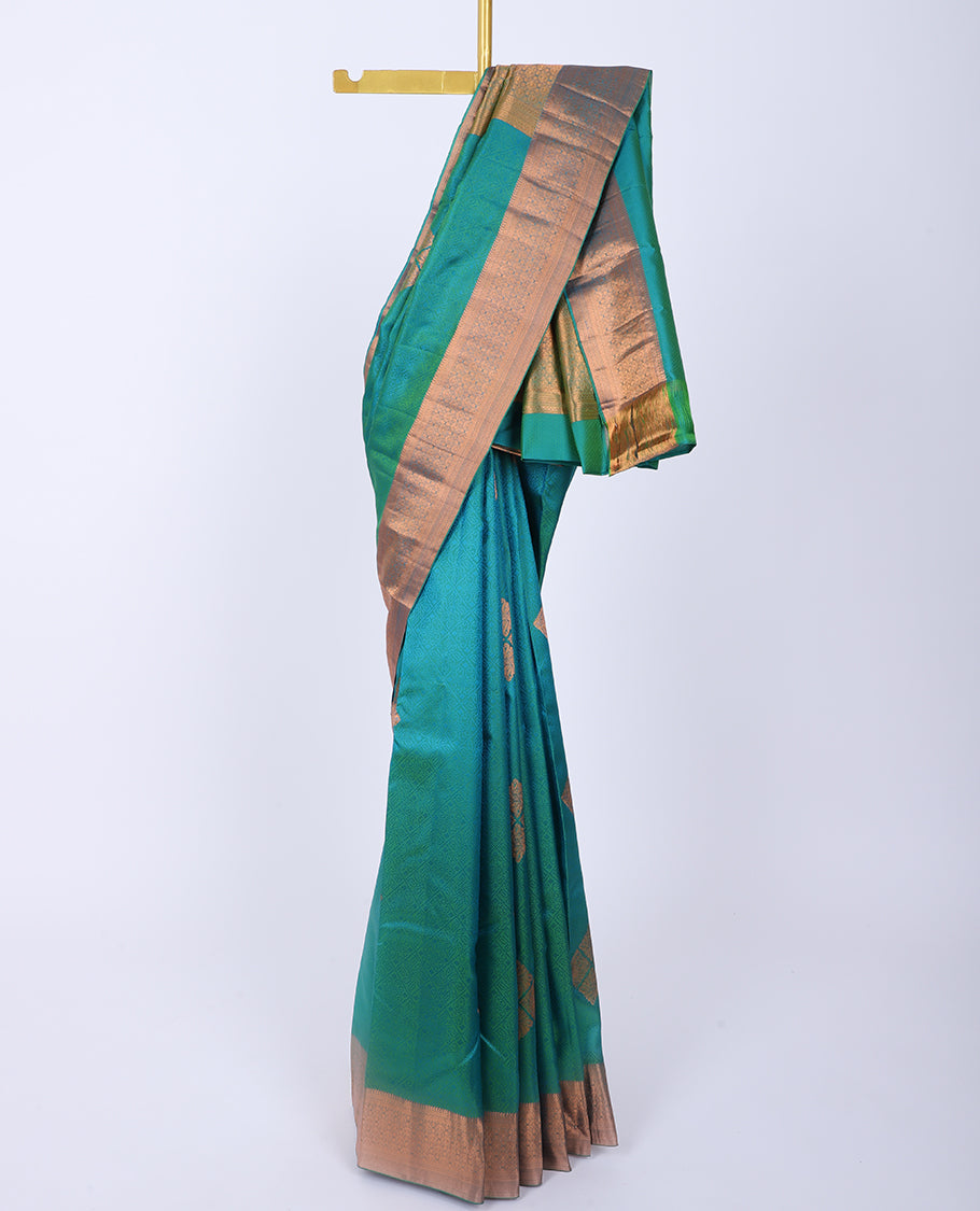 Green embossed Bangalore silk saree with zari buttas, traditional zari border & pallu of intricate designs