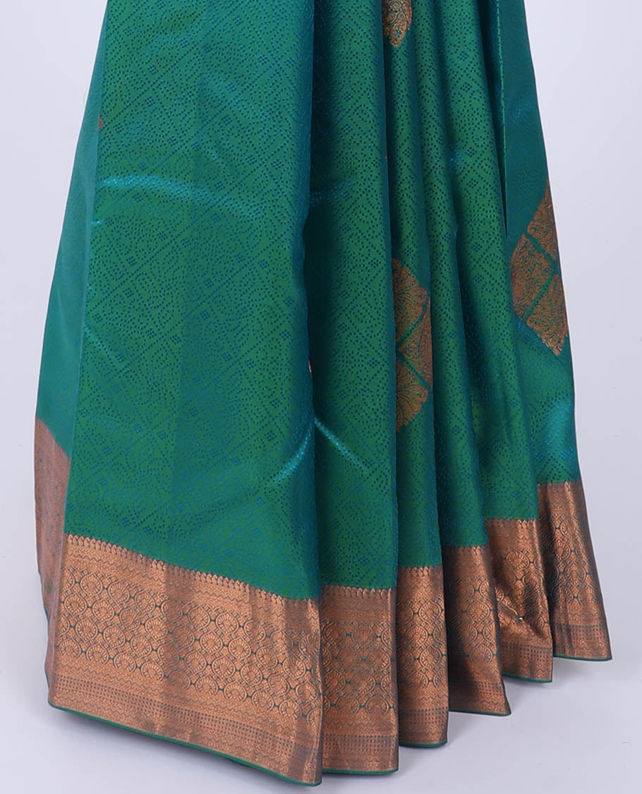 Green embossed Bangalore silk saree with zari buttas, traditional zari border & pallu of intricate designs