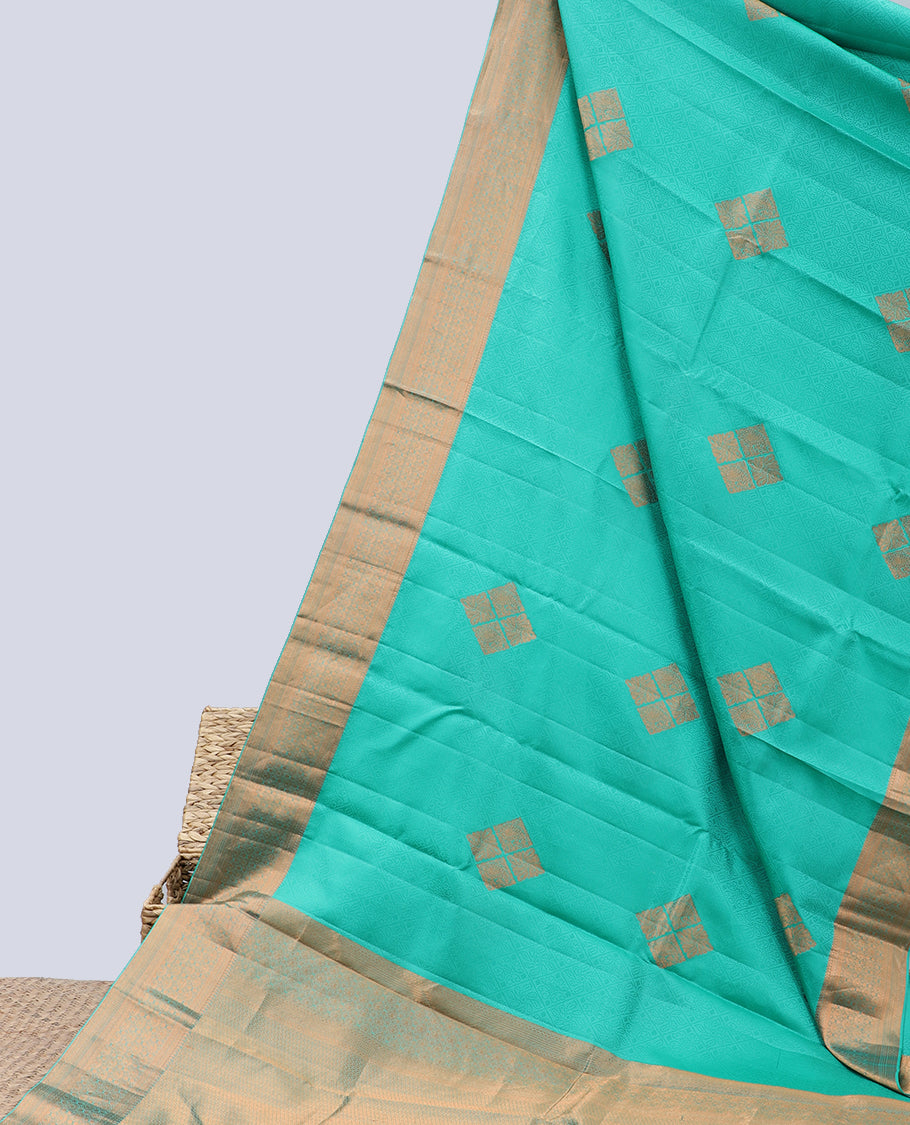 Green embossed Bangalore silk saree with zari buttas, traditional zari border & pallu of intricate designs