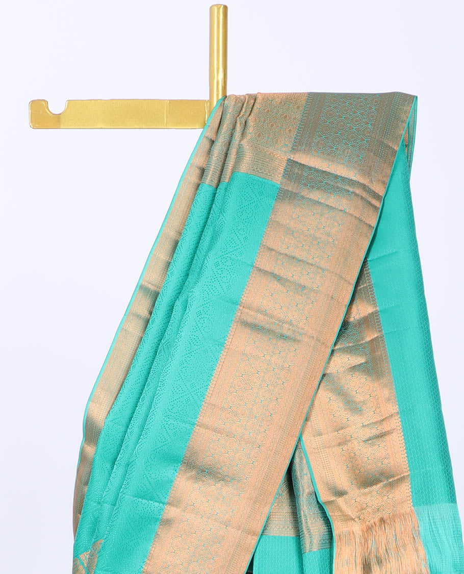 Green embossed Bangalore silk saree with zari buttas, traditional zari border & pallu of intricate designs