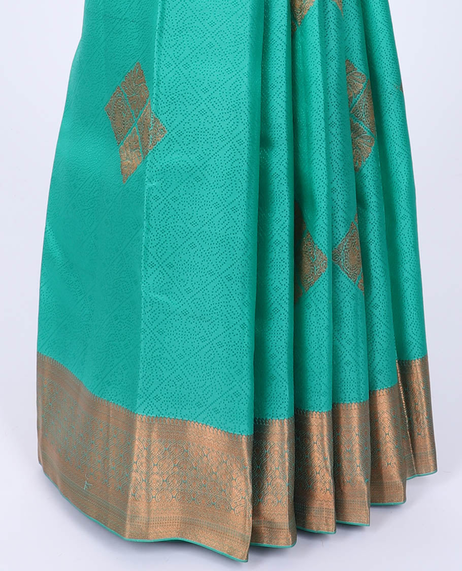 Green embossed Bangalore silk saree with zari buttas, traditional zari border & pallu of intricate designs