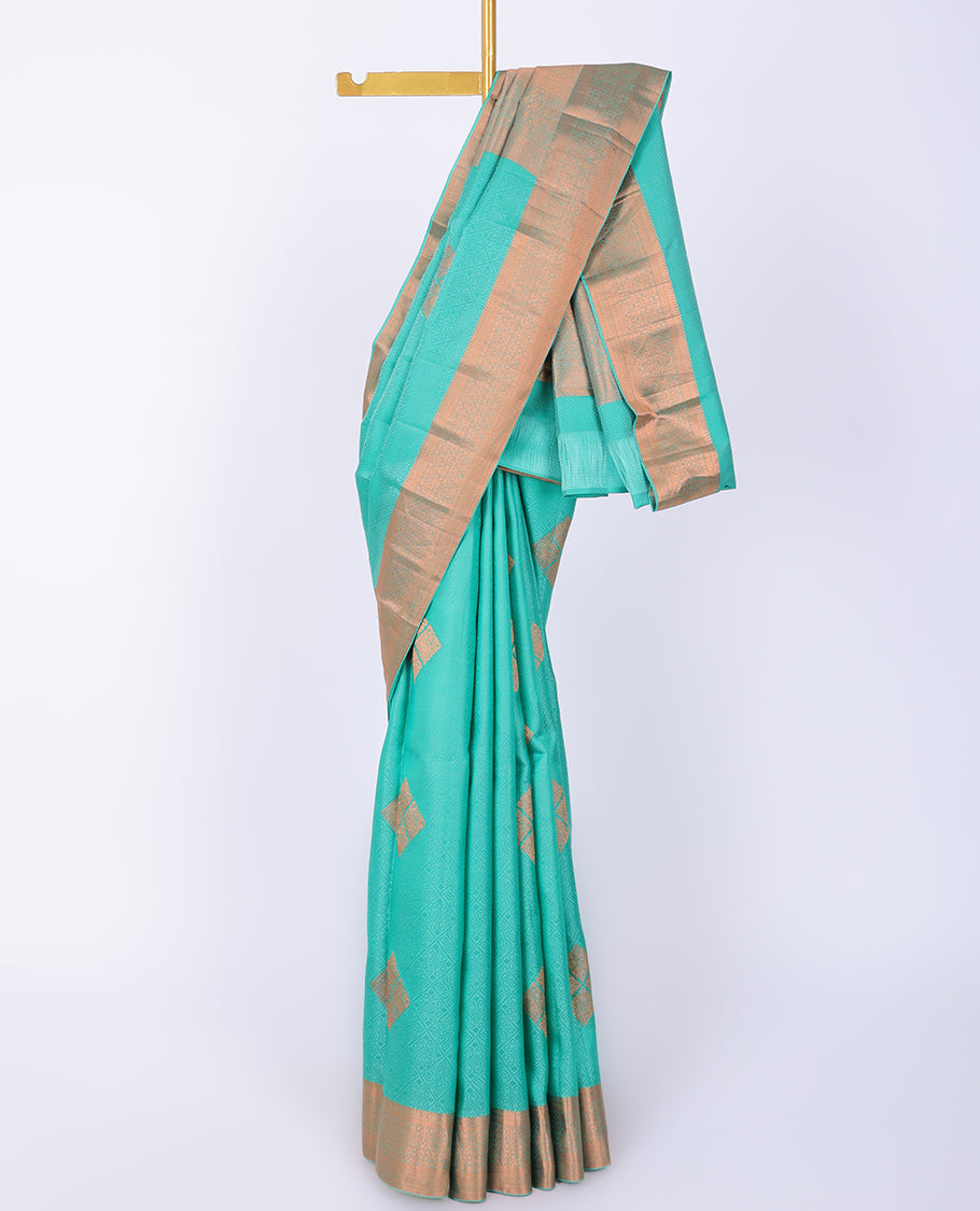 Blue embossed Bangalore silk saree with zari buttas, traditional zari border & pallu of intricate designs