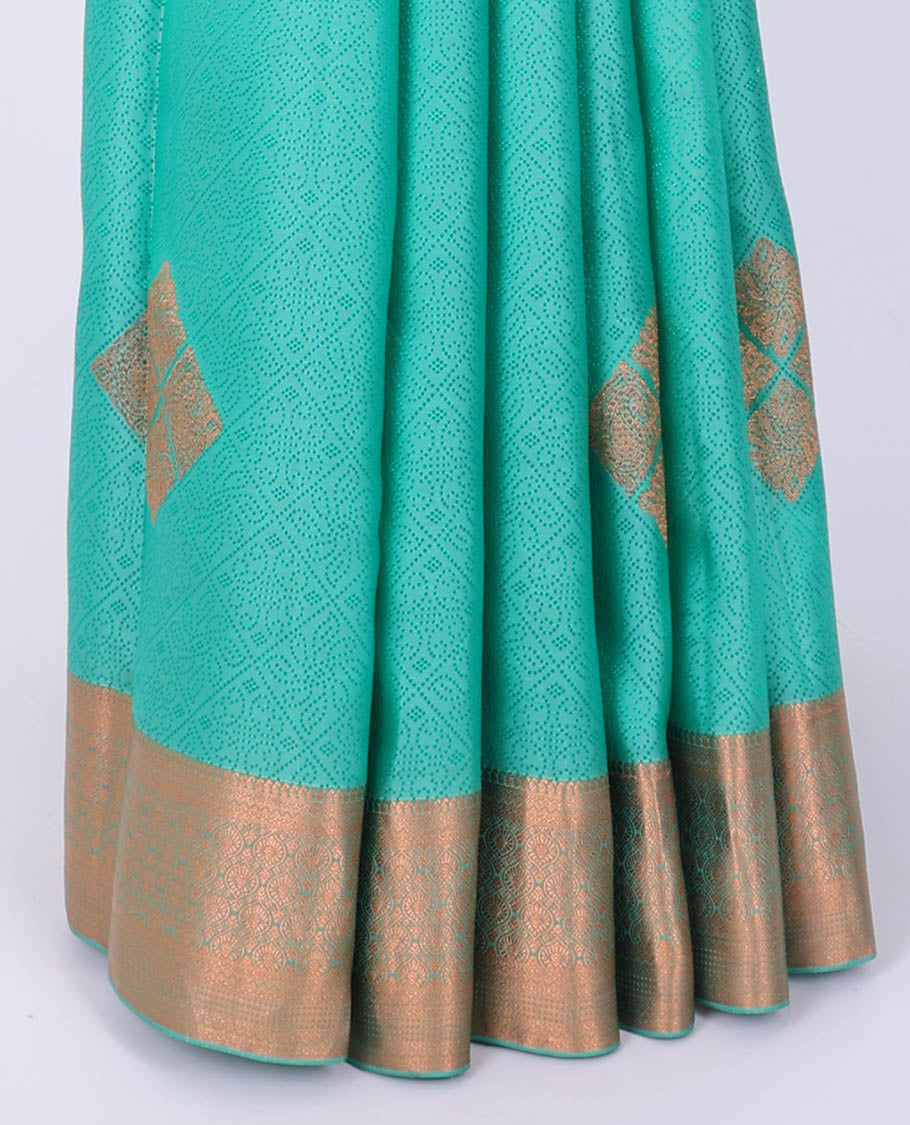 Blue embossed Bangalore silk saree with zari buttas, traditional zari border & pallu of intricate designs