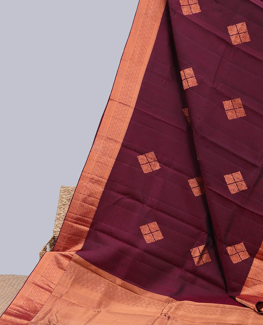 Maroon embossed Bangalore silk saree with zari buttas, traditional zari border & pallu of intricate designs