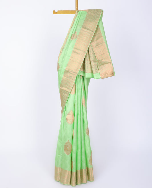 Green embossed bangalore silk saree with zari buttas, traditional zari border & pallu of jaal designs
