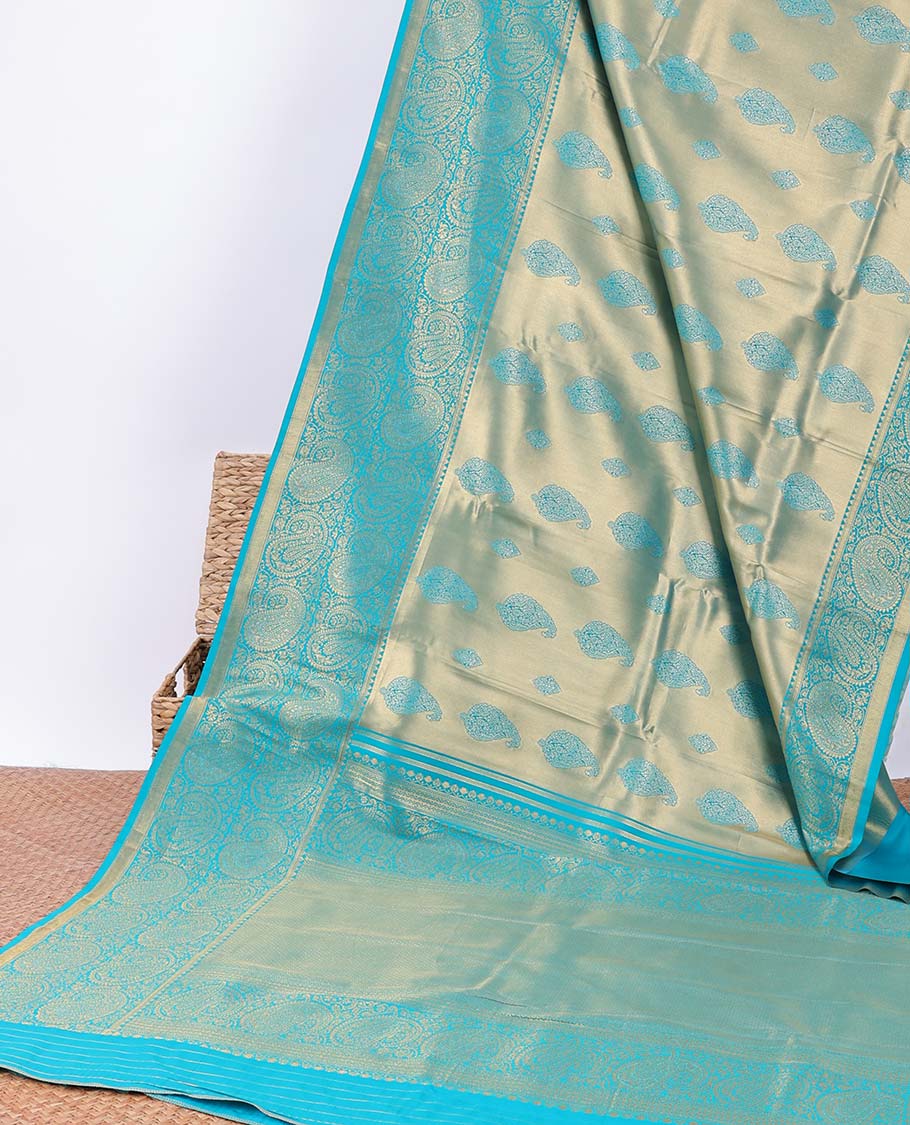 Blue paisley design Semi banaras tissue saree, border of embellished paisley motifs & intricate pallu of paisleys