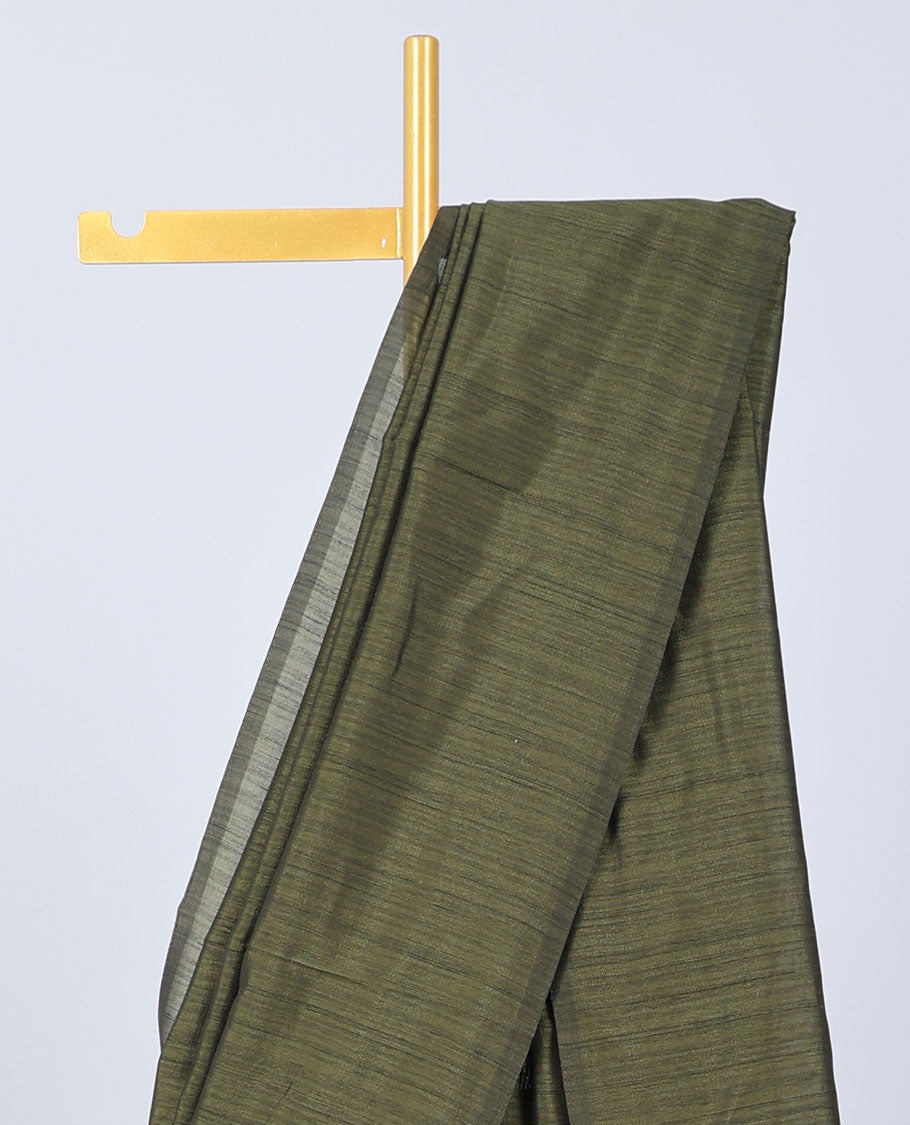 Borderless green plain kamala silk saree, contrast floral vine printed blouse 