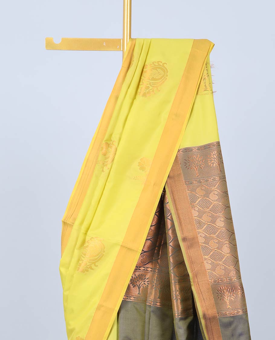 Yellow fancy saree with zari buttas, zari border & contrast pallu of ogee patterns