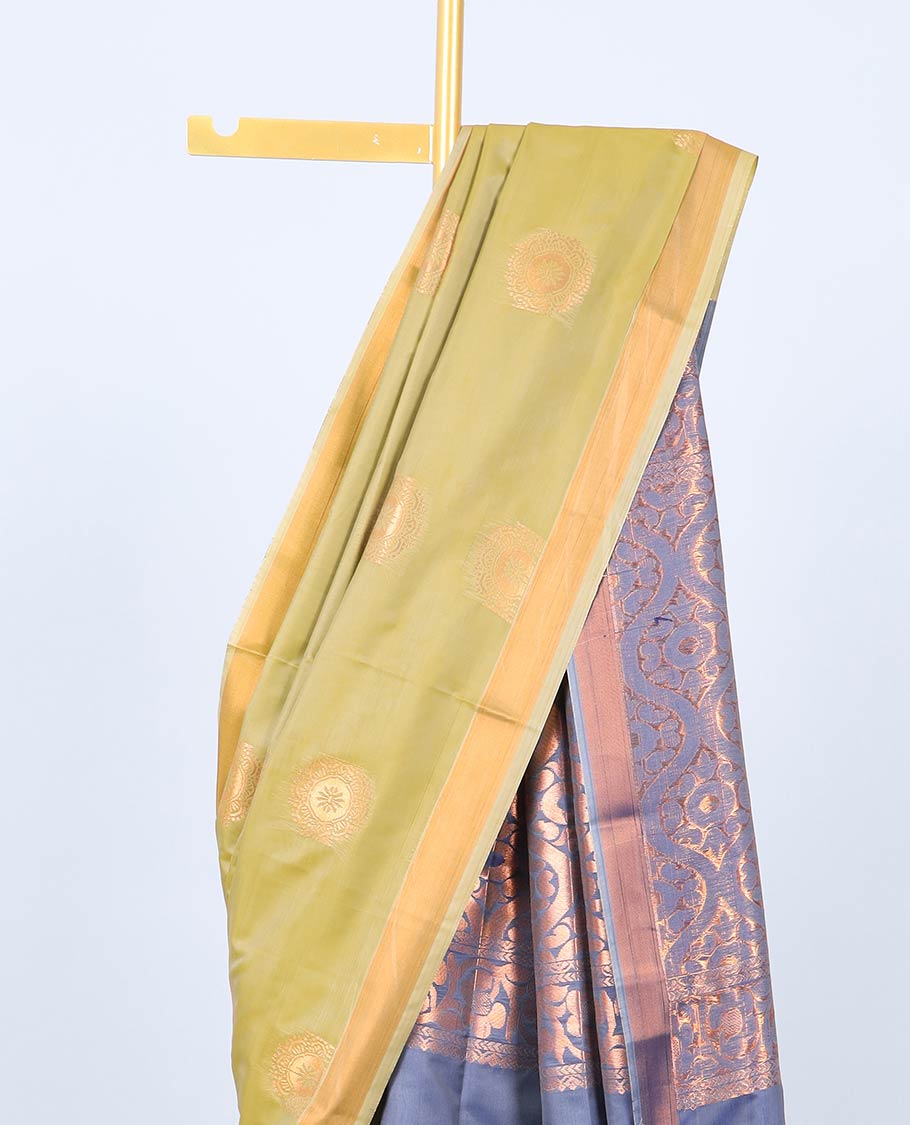 Green fancy saree with zari buttas, zari border & contrast pallu of ogee patterns
