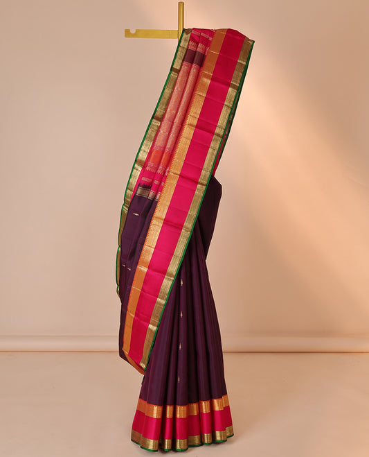 Purple silk saree with buttas, contrast rettai pettu border of rekku,muthu,banaras & kathir & zari-rich pallu