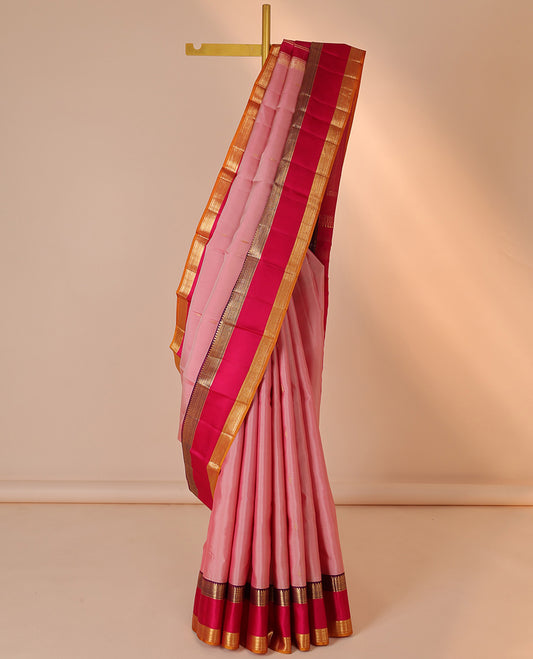 Pink silk saree with buttas, contrast rettai pettu border of rekku,muthu,banaras & kathir & zari-rich pallu