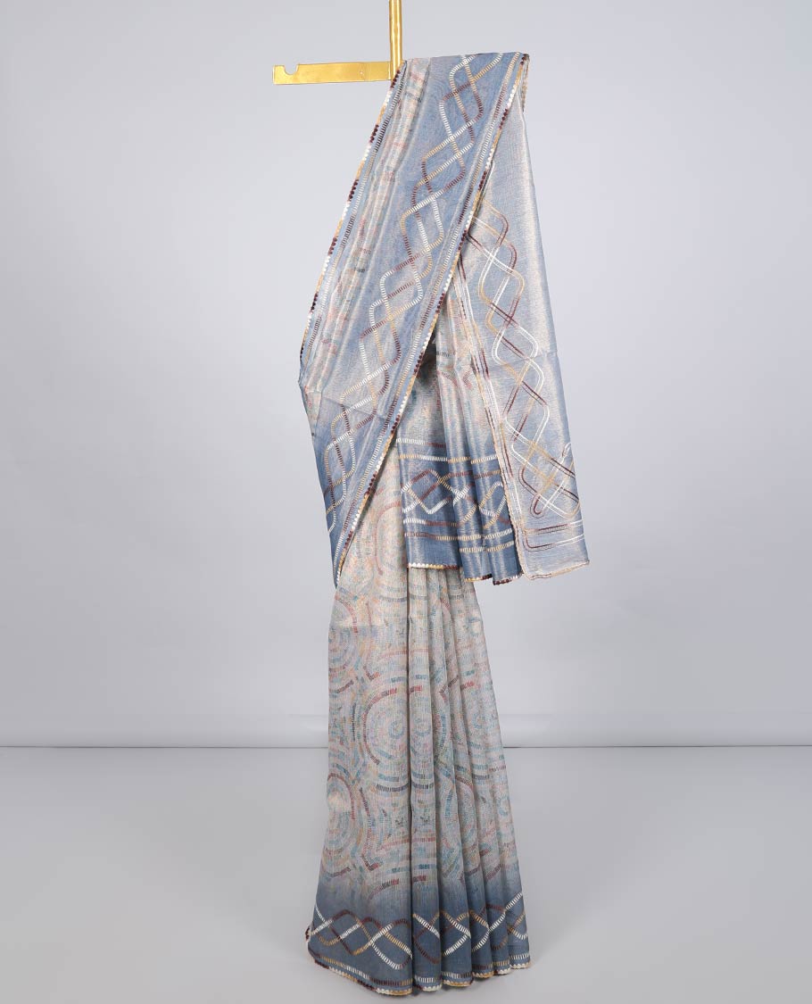 Multi-color uniquely printed semi-banaras linen saree, contrast thread work border & pallu