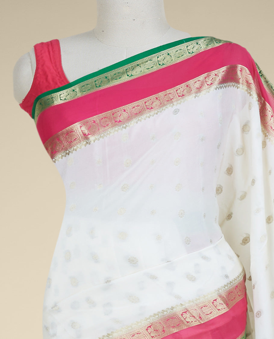 Cream mysore silk saree with zari buttas,contrast rettai pettu border of peacock & floral designs & pallu of jaal design
