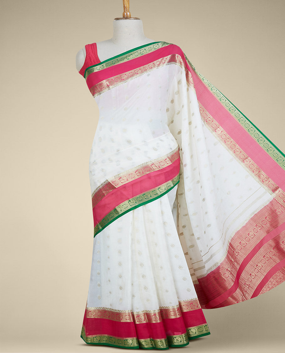 Cream mysore silk saree with zari buttas,contrast rettai pettu border of peacock & floral designs & pallu of jaal design