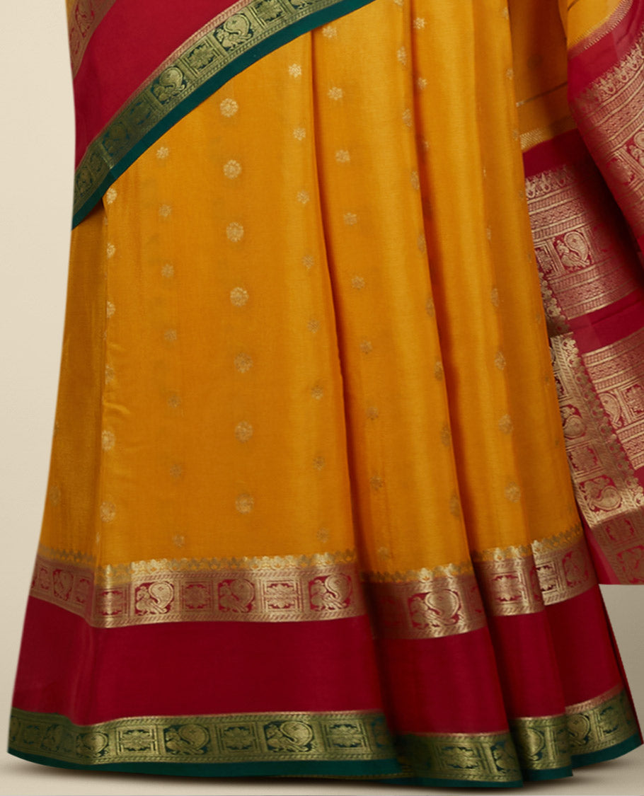 Orange mysore silksaree with zari buttas,contrast rettai pettu border of peacock & floral & pallu of jaal designs 