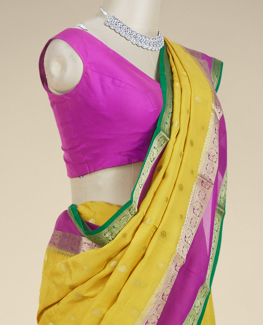 Yellow zari buttas mysore silk saree, contrast rettai pettu border of peacock & floral designs & pallu of jaal designs