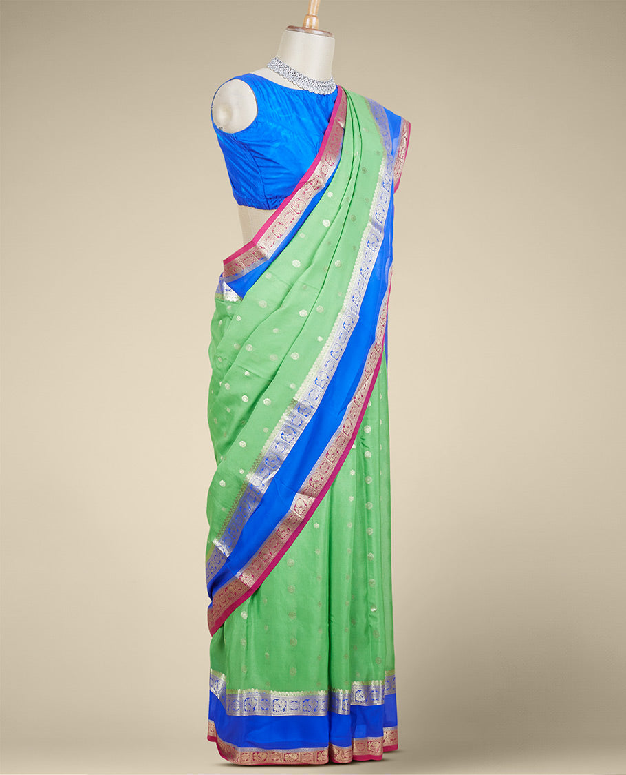 Green zari buttas mysore silk saree, contrast rettai pettu border of peacock & floral designs & pallu of jaal designs