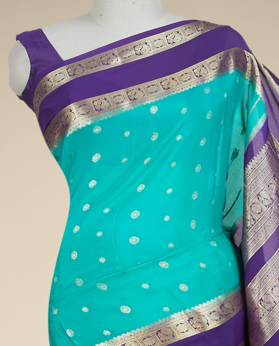 Green mysore silk saree with zari buttas, contrast rettai pettu border of peacock floral & pallu of jaal design