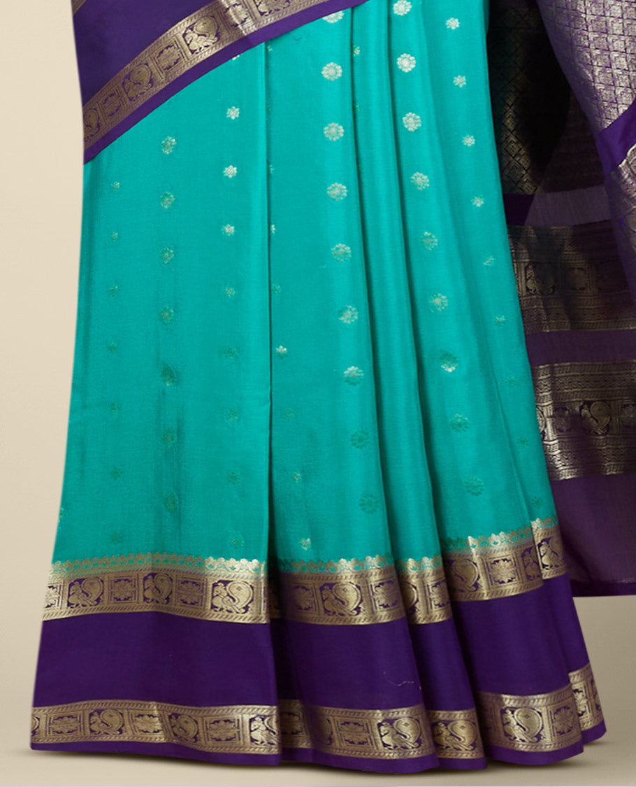 Green mysore silk saree with zari buttas, contrast rettai pettu border of peacock floral & pallu of jaal design
