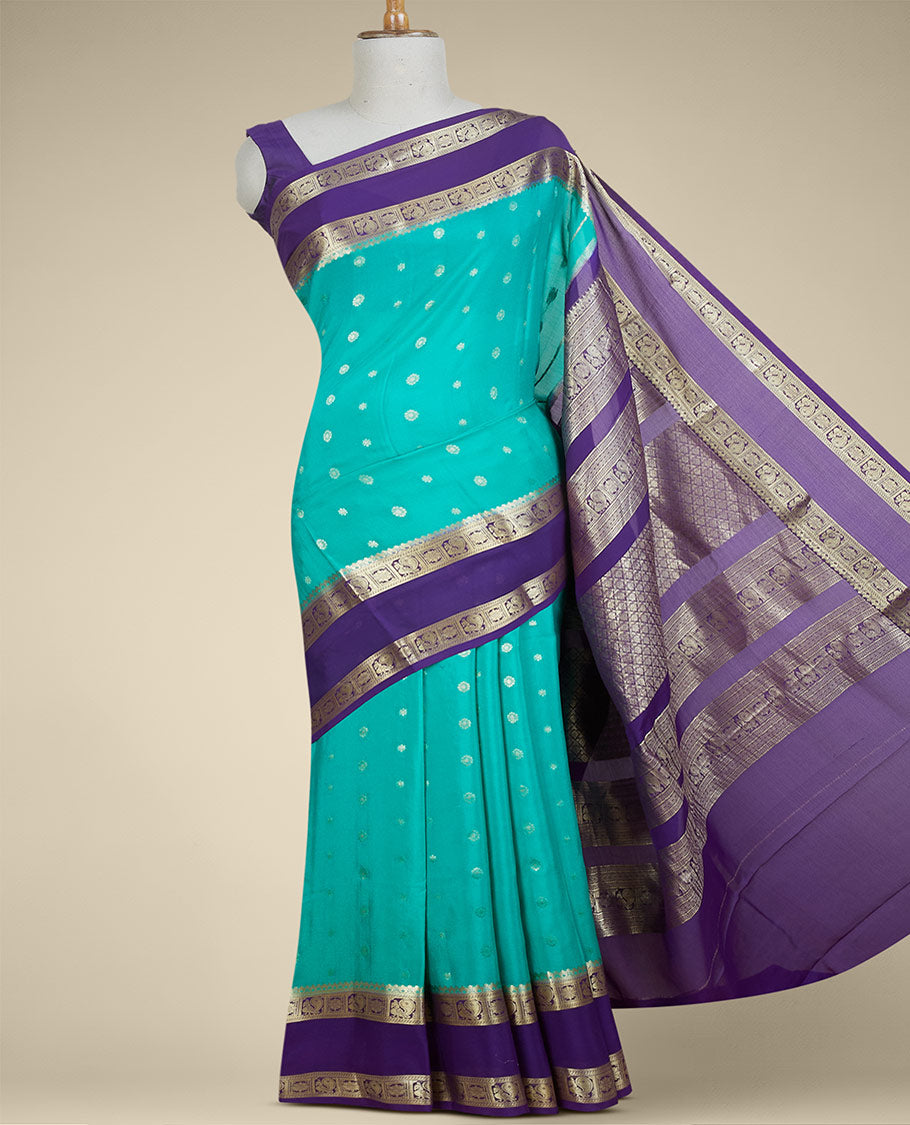 Green mysore silk saree with zari buttas, contrast rettai pettu border of peacock floral & pallu of jaal design