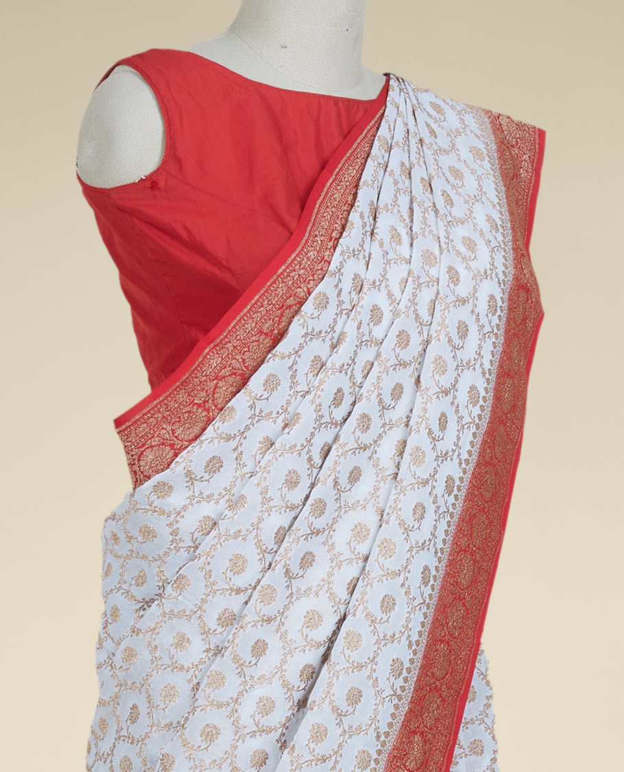 Cream floral jaal jacquard banaras georgette saree, contrast floral creeper border & intricate pallu